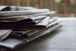 Image of Stacked Newspaper.