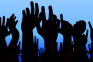 Image of raised hands
