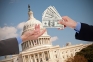 Image of money in front of the US Capitol