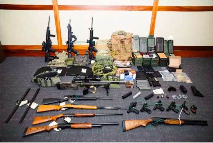 This image provided by the US District Court in Maryland shows firearms and ammunition; the photo was in the motion for detention pending trial in the case against Christopher Paul Hasson. US District Court via AP